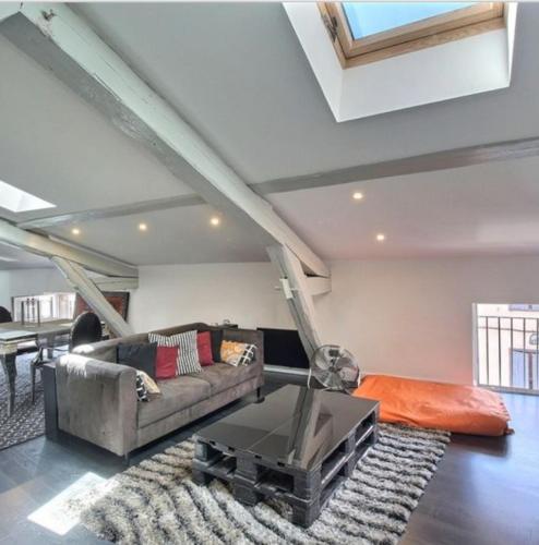 Loft, centre ville, atypique de 100m2