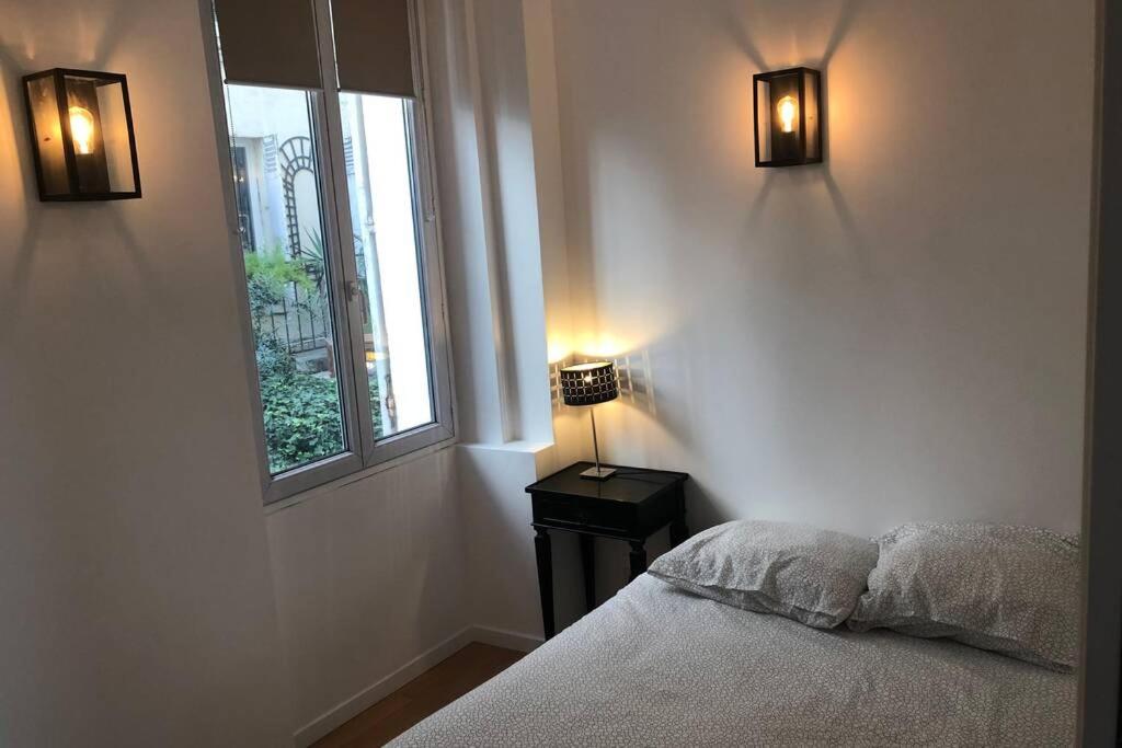 Appartement Loft de 2 chambres 5 minutes de la Tour Eiffel RDC gauche 25 Rue Augereau 75007 Paris