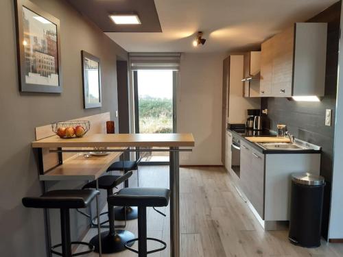 Logement 80 m2 avec terrasses entre les deux abers