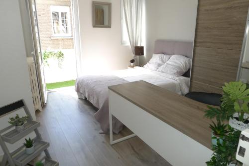 Logement Place d'Erlon hypercentre avec balcon