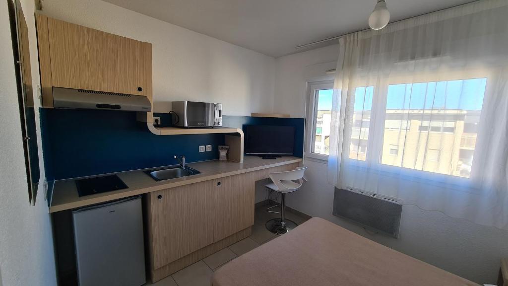 Appartement Logesty Studio Cosy 300 Avenue Charles Deperet 66000 Perpignan