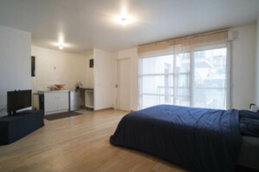 Appartement Lovely 1-bedroom unit with free parking on premise 2 Rue Laure Fiot 92600 Asnières-sur-Seine