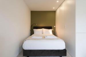 LovelyStay - Modern Loft with Gym & Free Parking minutes away from CBD