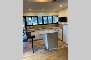 Lumineux appartement au milieu des arbres