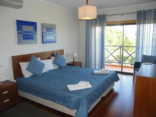 Luxurious first floor apartment with balconies overlooking pool and gardens.