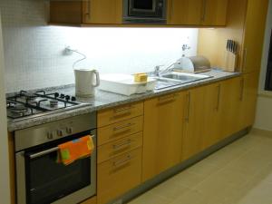 Luxurious first floor apartment with balconies overlooking pool and gardens.