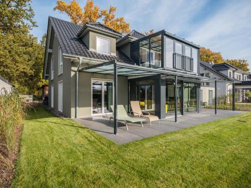 Luxus FeWo 122 m² direkt am Wasser mit Boot