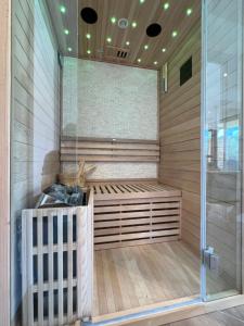 Magnifique appartement classé 4 étoiles avec Sauna et terrasse dans chalet