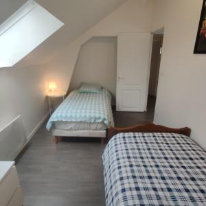 Maison 3 chambres. cour Privative 2 places de parking privatives