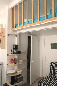 Appartement Maisonnette studio maisonnette sur cour 93 Rue du Faubourg Saint-Martin 75010 Paris Île-de-France