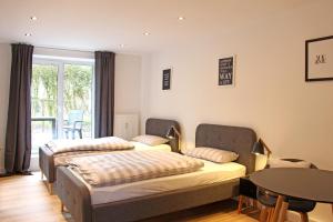 Moderne 1-Zimmer Wohnung mit Terasse, Küche, Bad mit Dusche, TV & WIFI