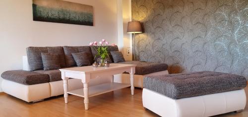 Moderne Ferienwohnung mit eigenem Garten und traumhaften Blick
