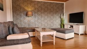 Moderne Ferienwohnung mit eigenem Garten und traumhaften Blick