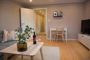 Moderne Wohnung im Grünen mit privatem Garten