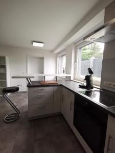 Moderne Wohnung mit Terrasse und eigenem Zugang.