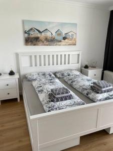 Modernes 2-Raum Apartment am See - Pool und Sauna.