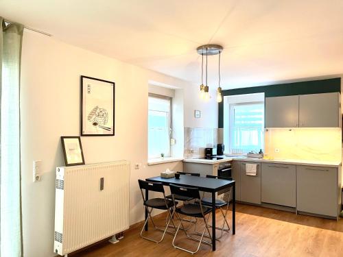 Modernes ORIGAMI Maisonette-Apartment mit Terrasse in Zentrum Stuttgart