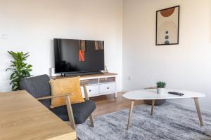 Modernes und Zentralgelegenes Apartment mit Küche, Netflix, und Balkon