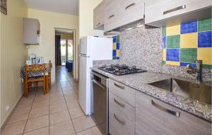 Nice apartment in Propriano with 1 Bedrooms, WiFi and Outdoor swimming pool