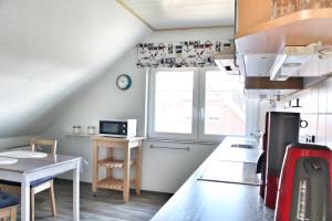 Nordsee Anker Unsere moderne 87 qm Ferienwohnung in Norden Ortsteil Ostermarsch