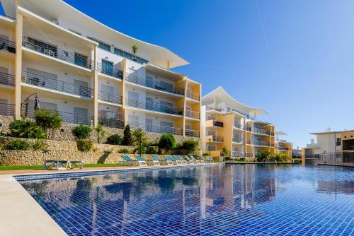 Ocean view Apartment with sunbathing Terrace, 2 Swimming pools & Tennis court