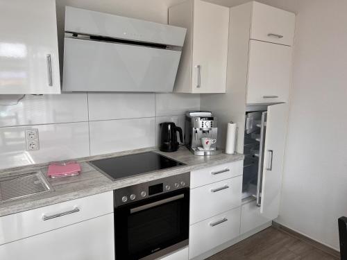 Ostfrieslands Perle Ferienwohnung an der Nordseeküste, Sauna, Terrasse, Garten, ruhige Lage, WLAN