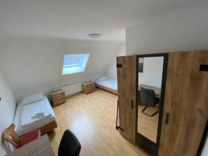 Othman Appartements Groß Buchholzer Straße 16a