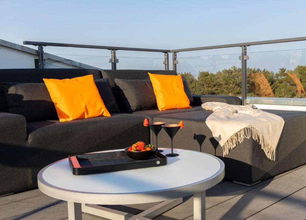 Appartement Penthouse am Südstrand - Kamin, Dachterrasse mit Meerblick und Gasgrill, Luxus-Design-Apartment, 2 Minuten zum Strand Südstrand 18609 Binz