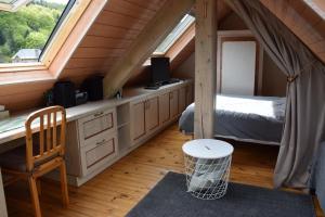 Petit duplex de charme sous les toits du Mont-Dore