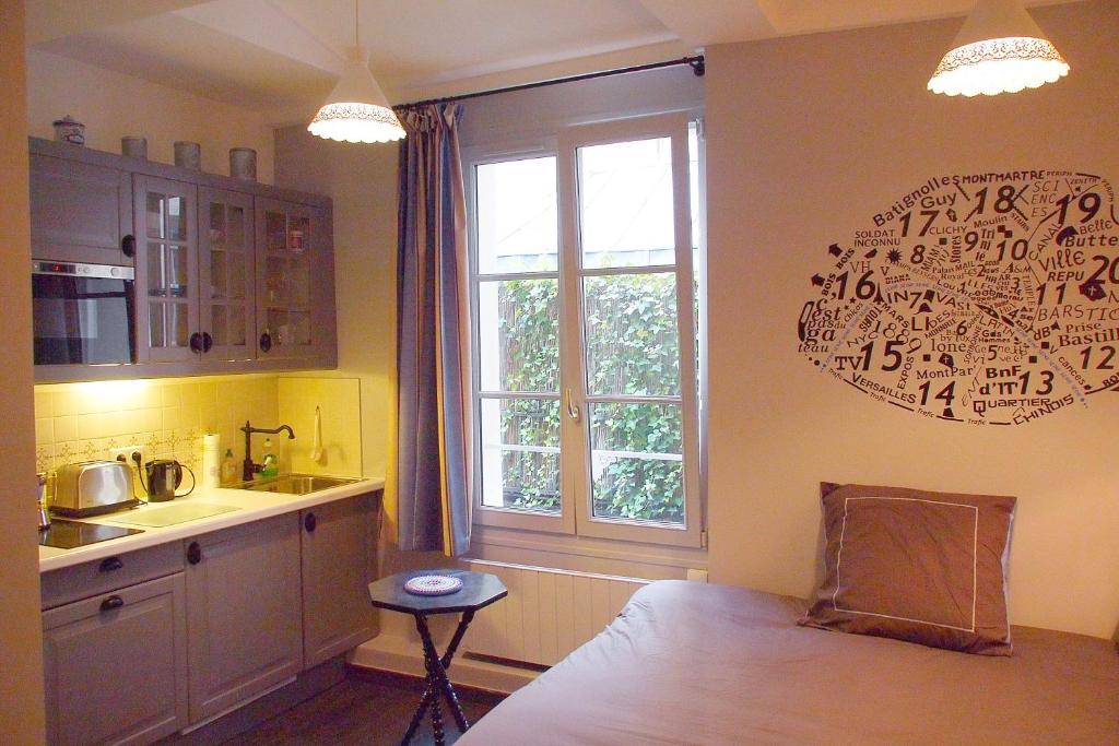 Appartement Petit Paris - Oasis in Marais 1 Passage de l'Ancre 75003 Paris