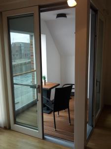 Pier One mit Balkon & Parkplatz - barrierefrei - ABC244