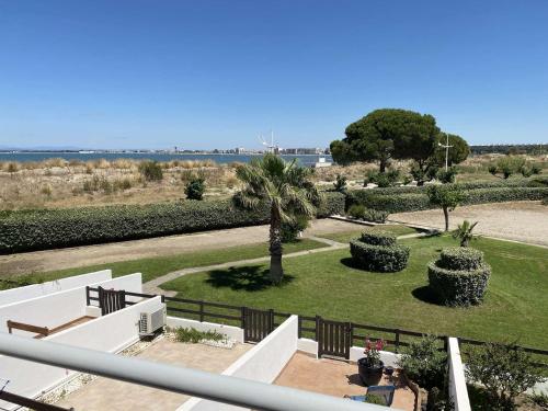 Appartement Appartement Port Camargue, 2 pièces, 4 personnes - FR-1-250-170 2 AVENUE JEAN LASSERRE APPARTEMENT N°210 - ENTREE F - 1ER ETAGE - PK N°21 Le Grau-du-Roi