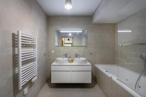 Quintessence- Apt B101- BO Immobilier