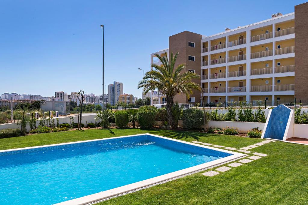 R Sunny Beach apt with pool and balcony Rua Dom Afonso V Edificio Varandas DÁgua, 2ºB, 8500-510 Portimão