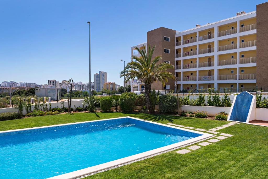 Appartement R Sunny Beach apt with pool and balcony Rua Dom Afonso V Edificio Varandas DÁgua, 2ºB 8500-510 Portimão