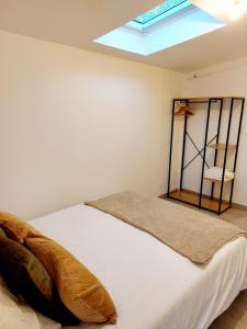 Ravissant T2 terrasse privative et parking