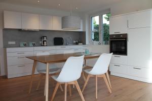 REBHAUS Ferienwohnung Weinlaube