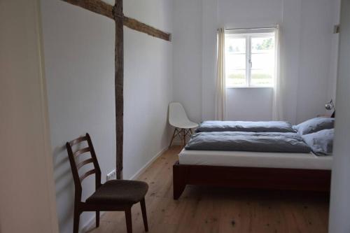 Reetgedeckte Fachwerkhaushälfte an der Ostsee