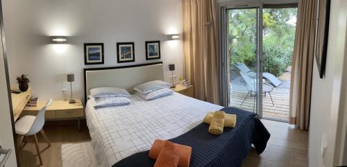 Residence Cala Sultana -Baie Santa Giulia - rez jardin 1ere ligne