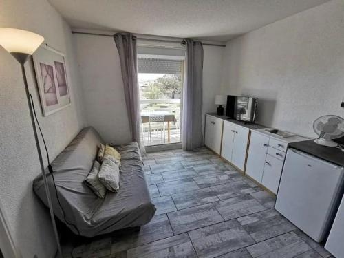 Résidence le Carlton -F2 rénové en front mer avec balcon