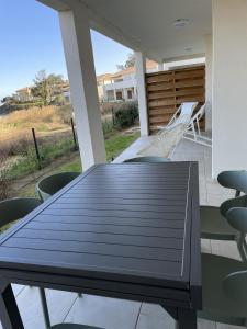 Résidence Marina di Bravone - appartement 10 personnes Vue Mer RDC N70-71