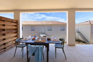 Residence Marina di Bravone - appartement 8 personnes RDC N5-6