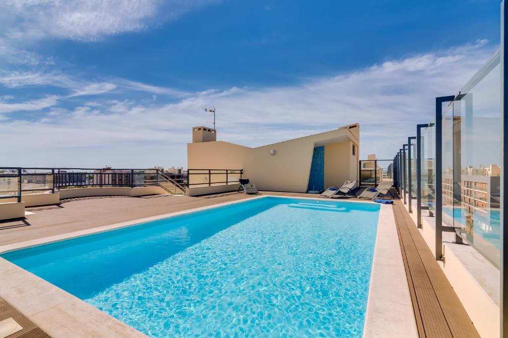 Ria House - beautiful apartment with swiming pool Urbanização Marina Village Lote 2 acesso 1 Piso 4°C, 8700-292 Olhão