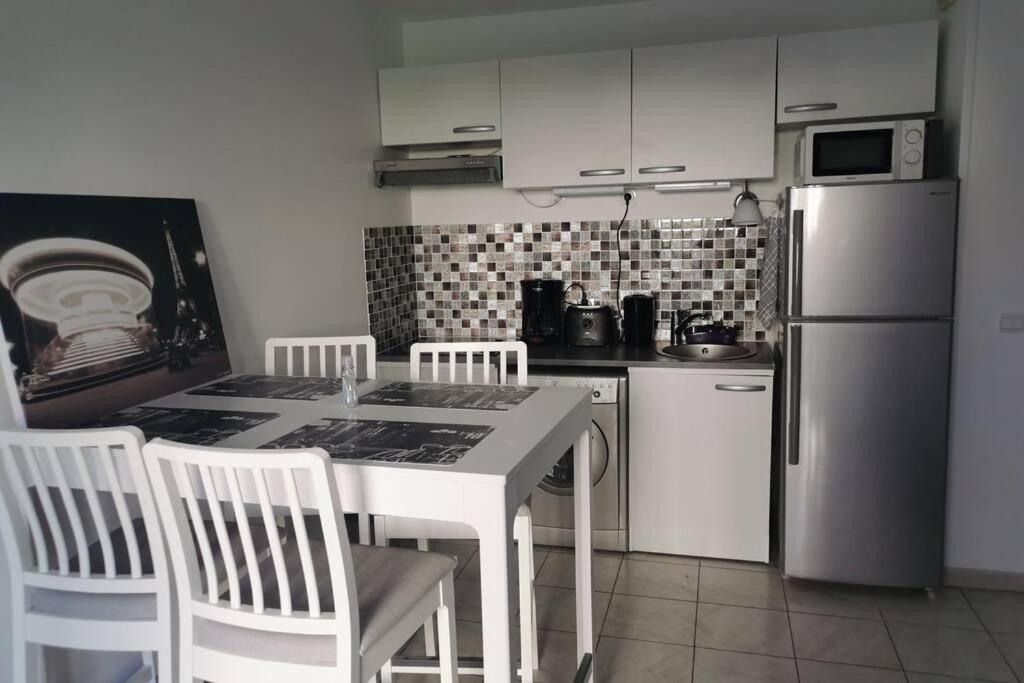 Appartement Riva Bella, Ouistréham, Charmant Rez-de jardin en bord de mer Bâtiment 215F 1 Rue Fontenelle 14150 Ouistreham