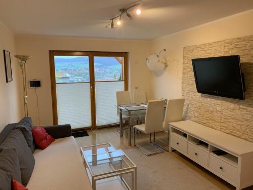 Romantische Ferienwohnung mit fantastischem Ausblick, Pool und Gartensauna