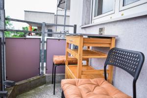 Ruhige Wohnung im . Private Parkplatz ,Balkon ,Netflix