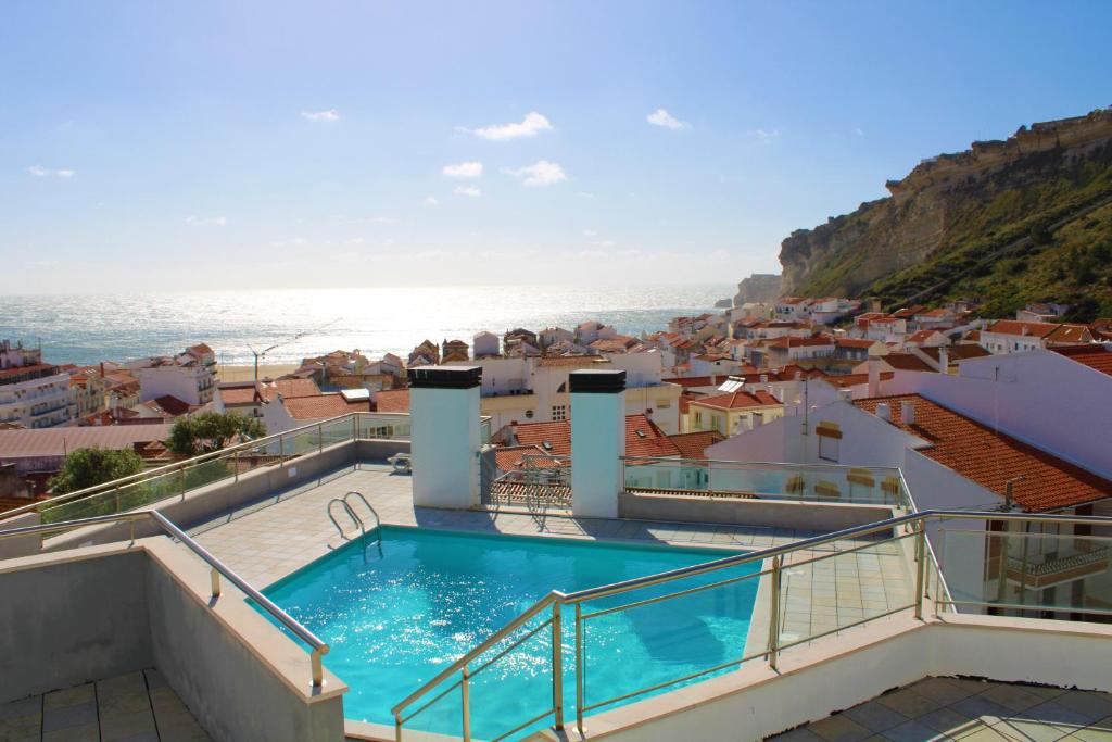 Appartement Salvador’s House T2 - Rooftop Pool & Nazaré Center Rua Doutor José Laborinho Marques da Silveira, Bloco A, Nº18, R/C, Fração J 2450-228 Nazaré