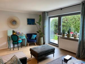 Schöne Wohnung mit Ausblick und Gartensitzplatz