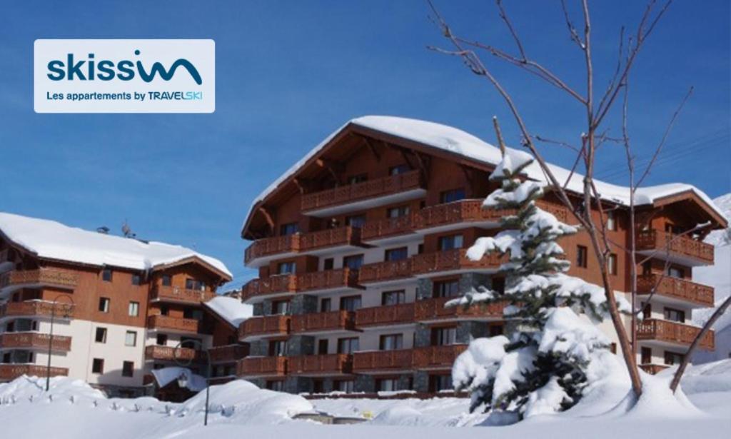 Skissim Premium - Les Chalets de l'Adonis 4 stars Skissim Premium - Les Chalets de l'Adonis 4*Les Menuires Bruyères, 73440 Les Menuires