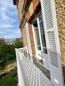 Somptueux appartement 25m2, balcon, plein centre